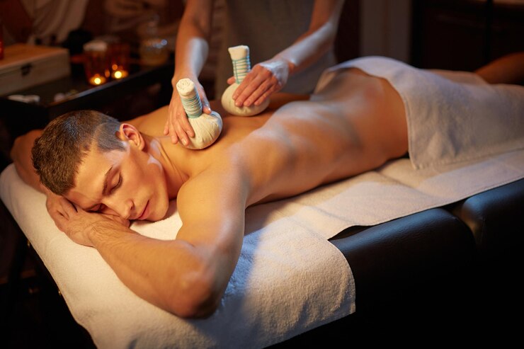 Young man enjoying Swedish Massage Therapy Buffalo NY